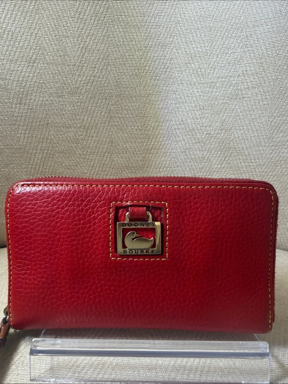 Dooney & Bourke Red Pebbled Leather Zip Wallet with Gold Plaque